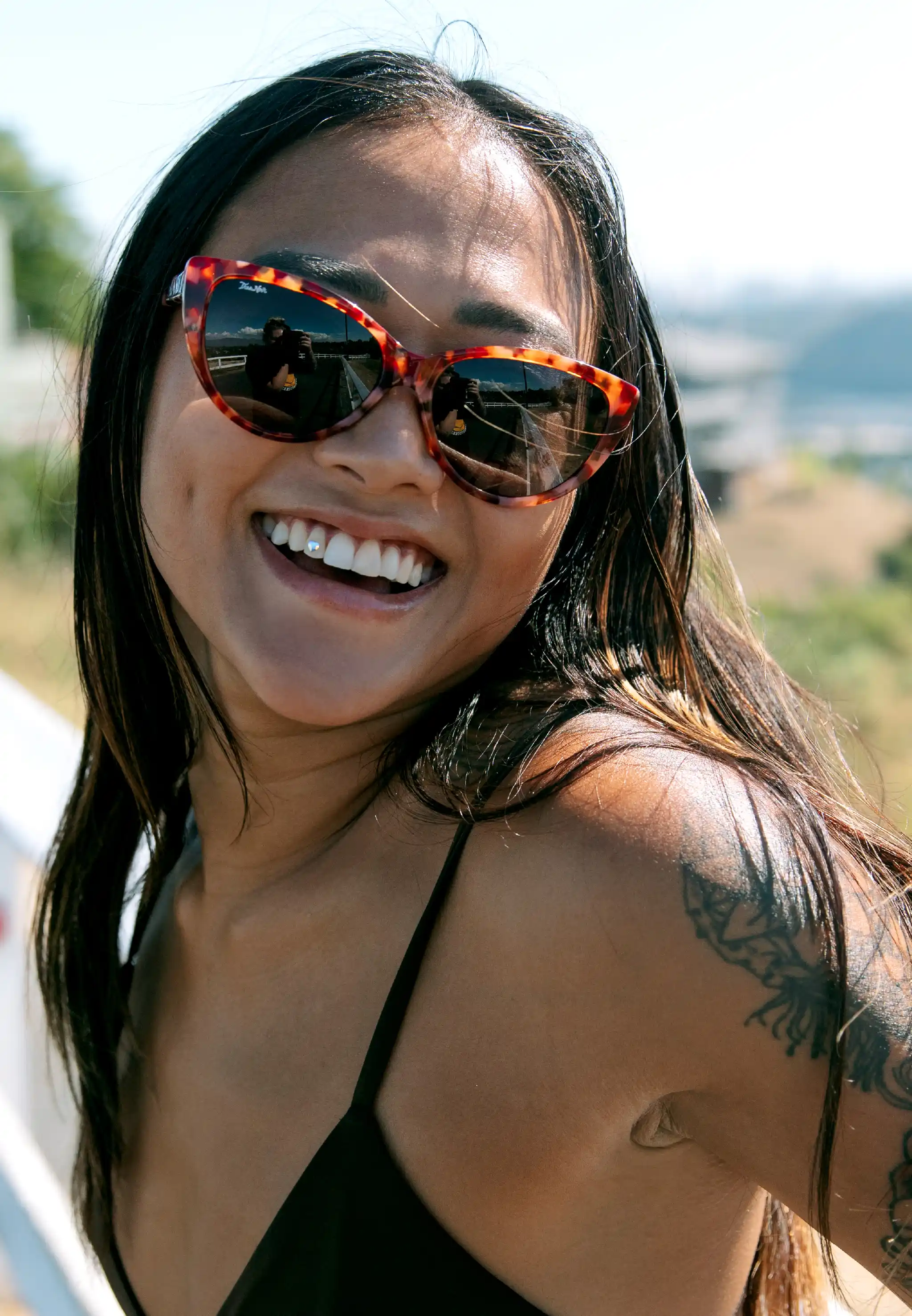 Woman wearing marmalade Ultra Lux sunglasses